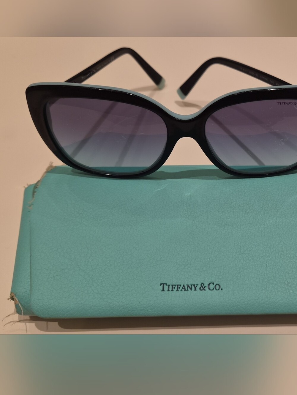 Tiffany & Co. Black Cat-Eye Sunglasses with Purple-Tinted Lenses